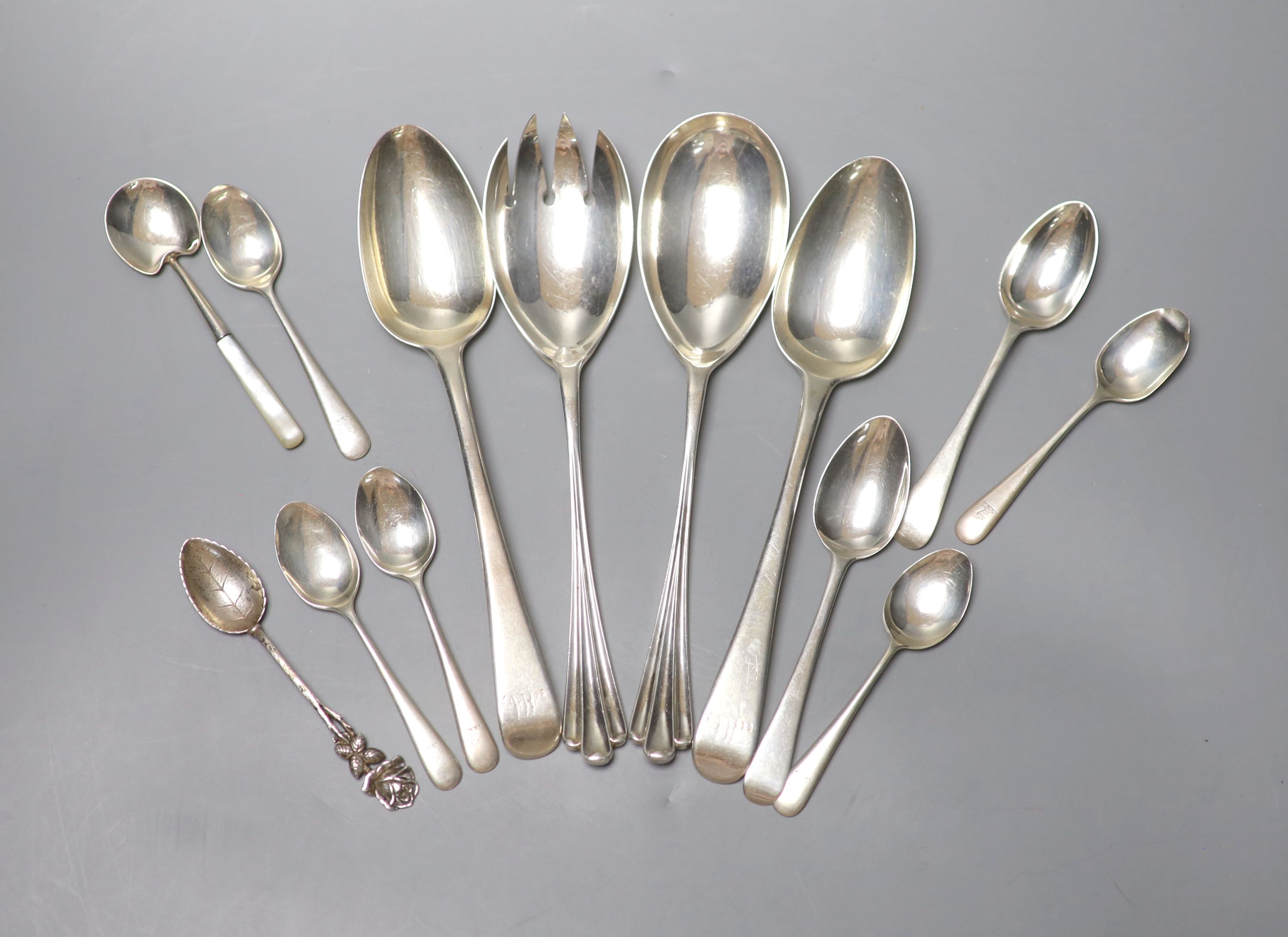 A small quantity of assorted 19th century and later silver flatware including a pair of salad servers, 12.5oz.